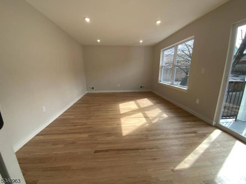 2 fam with garage 2 cars, renovated 2025 new kitchens new doors new siding new hvac units new hot water tanks new bathrooms