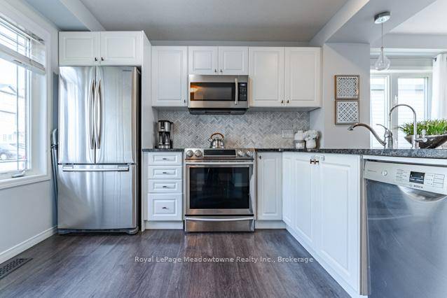 Welcome to this bright and beautifully updated 2 bedroom, 1 bathroom end unit condo townhouse a perfect blend of comfort and convenience !