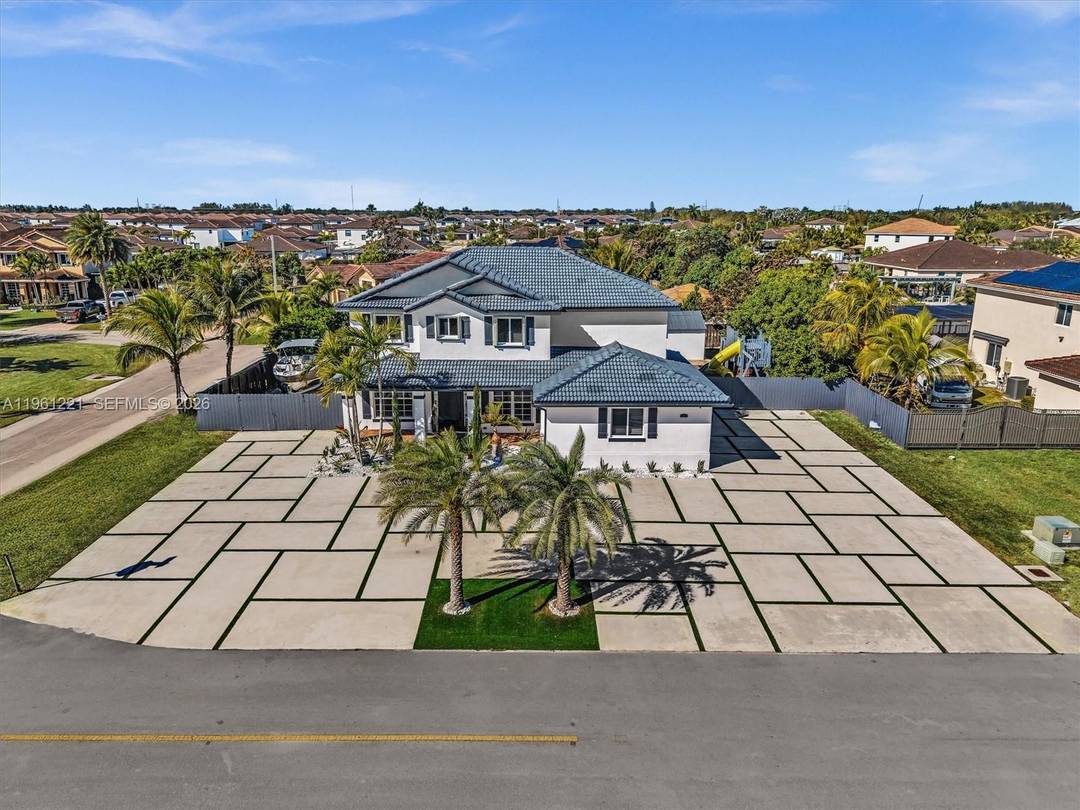 Welcome to this exceptional corner lot residence offering 5 bedrooms and 3 full bathrooms, including a full bedroom and bath on the main level ideal for guests or extended family.