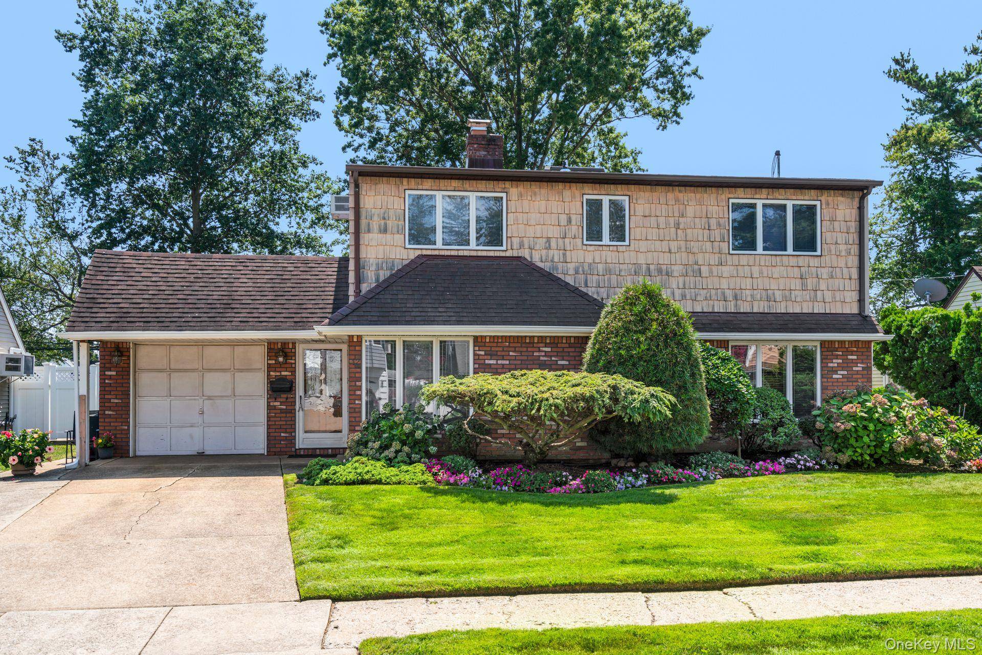This sun filled Colonial is an architectural delight featuring an open floor plan.
