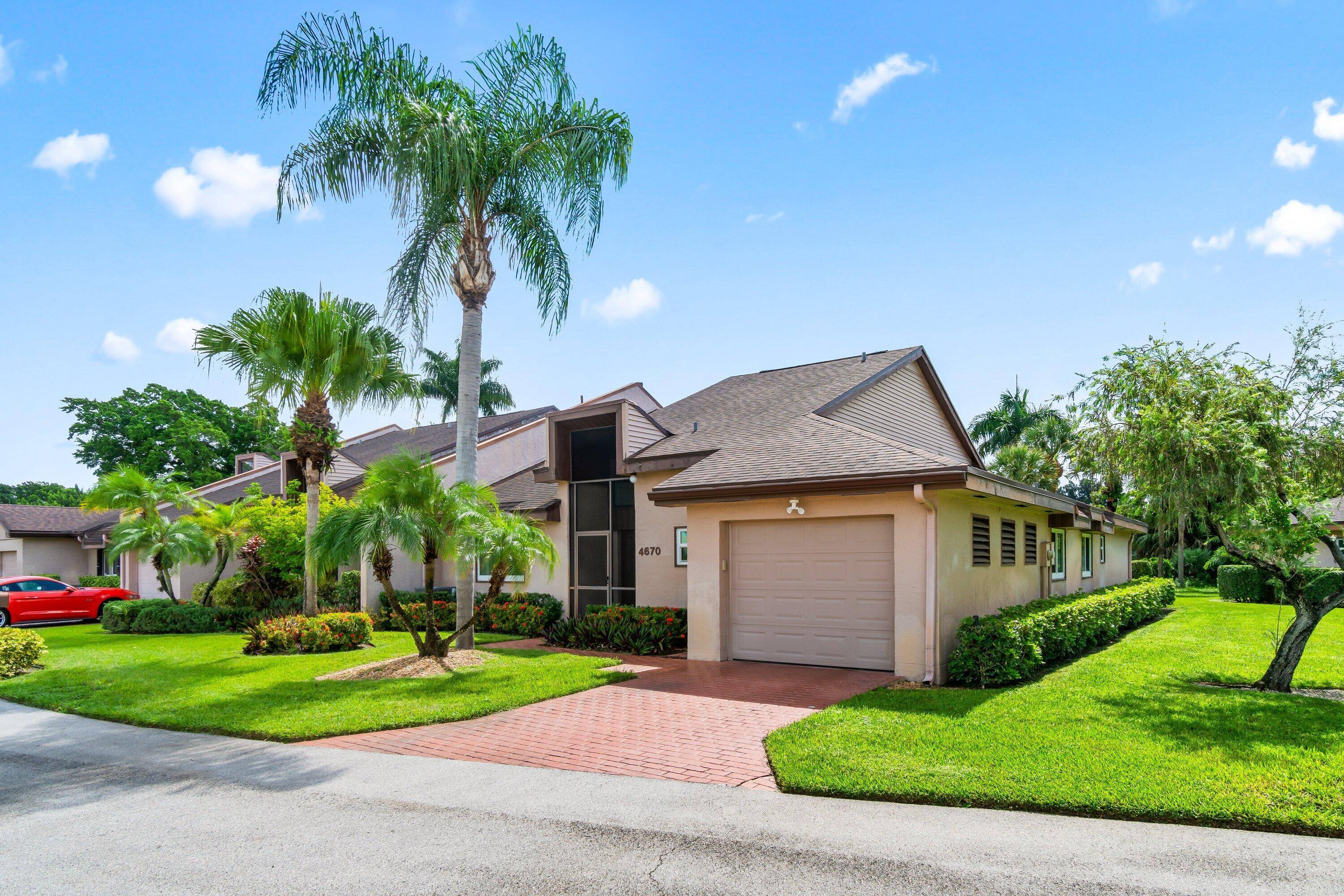 Discover modern elegance at 4670 Fountains Drive South in Lake Worth, FL.