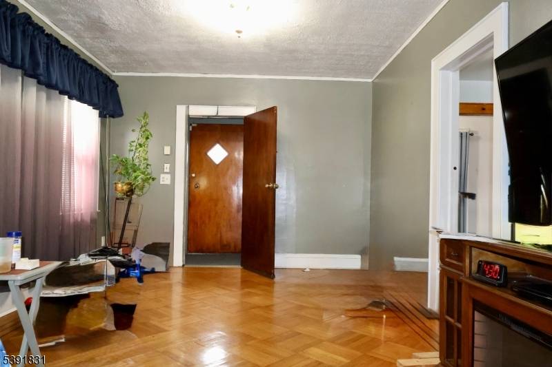 Welcome to this charming 3 bedroom, 2 bath Cape Cod Style home tucked away on a quiet, peaceful location in Irvington, NJ !