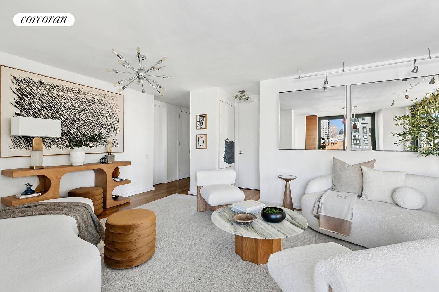 Fantastic corner two bedroom, two bath residence featuring a 33 foot wraparound terrace and abundant natural light throughout.
