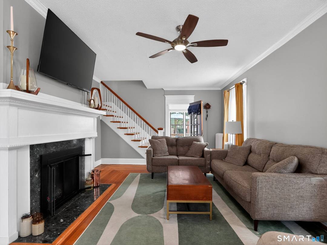 Welcome to this classic Colonial in Hamden's desirable Whitneyville neighborhood, full of charm and comfortable living space.