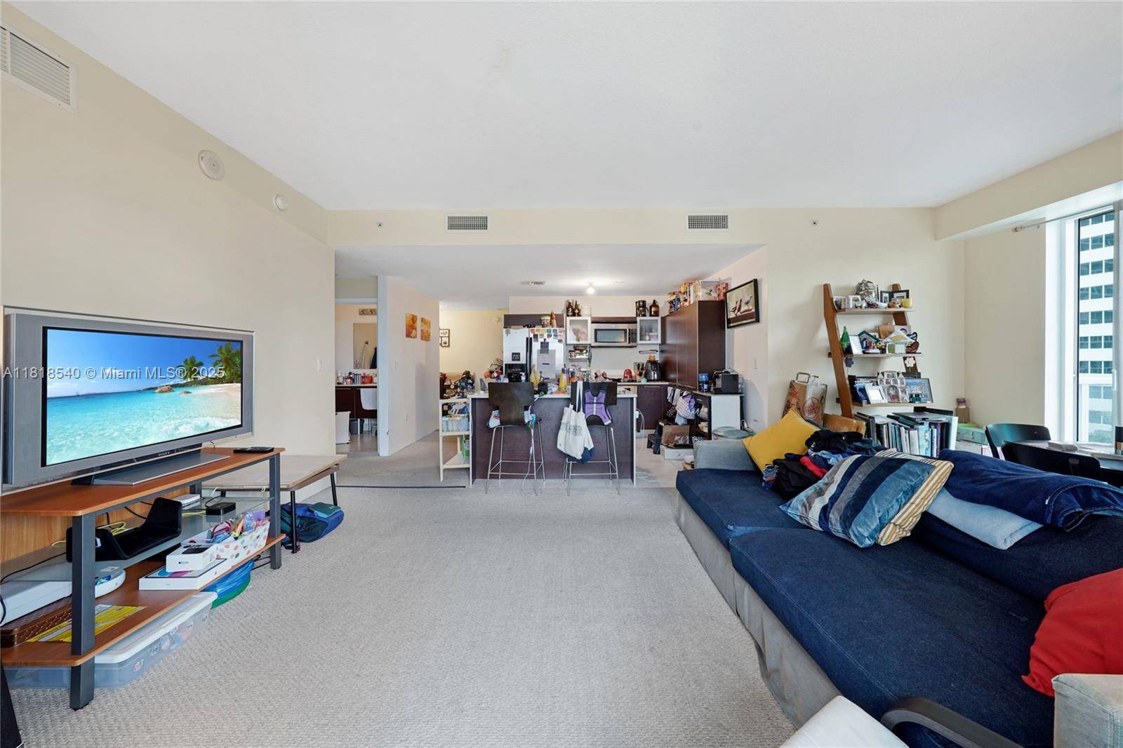 Perched on the 14th floor with city skyline and pool deck views, this spacious corner residence in Miami's sought after Edgewater neighborhood offers an unbeatable combination of location and potential.
