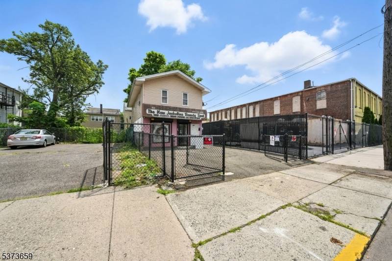 Welcome to 521 E 18th St, a high visibility mixed use property offering excellent business and investment potential.