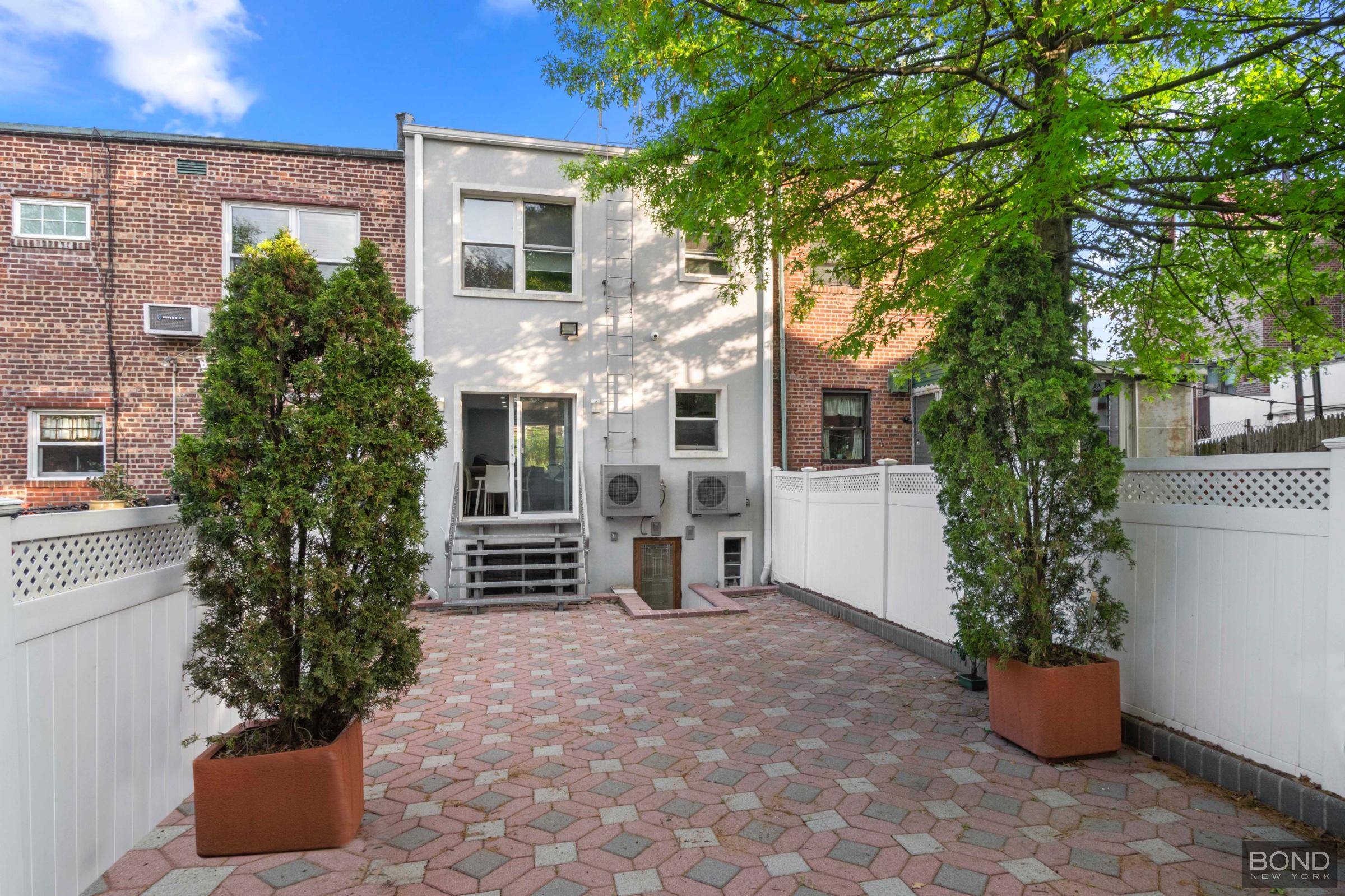 Introducing 82 15 Penelope Avenue A Meticulously Crafted Custom Home in the Heart of Middle Village.