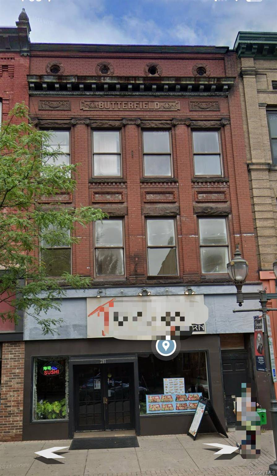 Mixed use building in the heart of downtown Oneonta featuring a street level commercial space and two residential units on the upper floors.