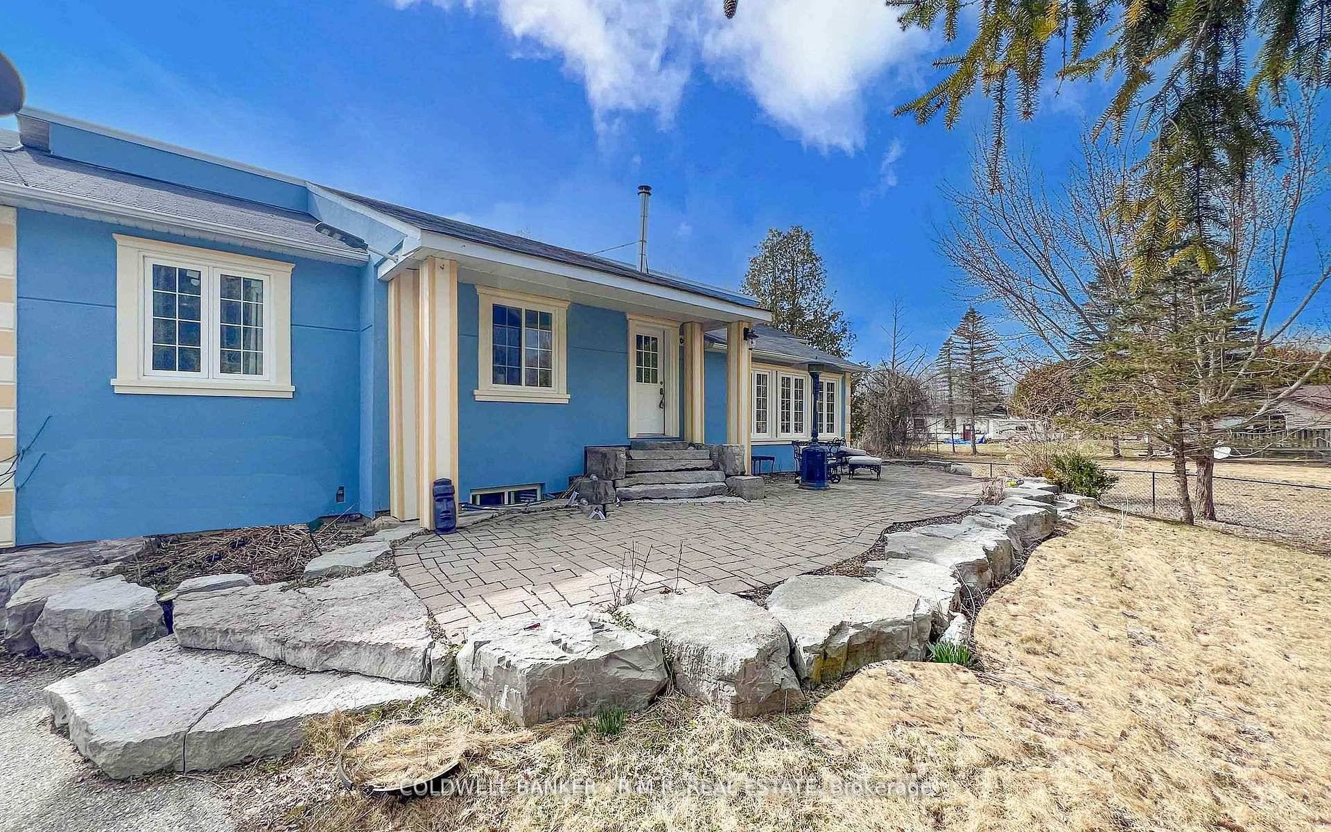 This elevated bungalow, nestled within a tranquil cul de sac, offers a serene escape while remaining conveniently close to amenities.