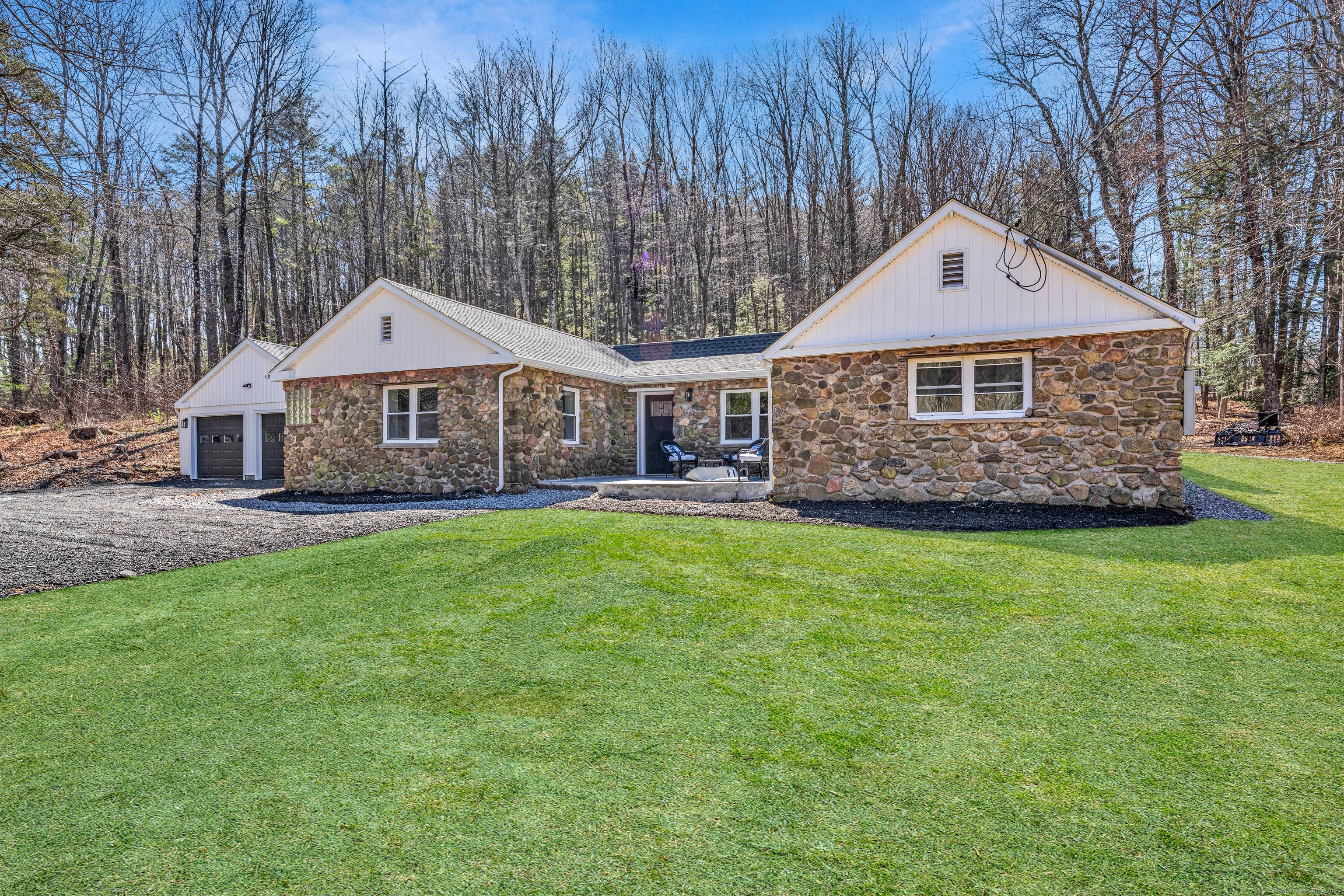 Welcome to this stunning mid century modern ranch, completely reimagined and renovated from the studs up !
