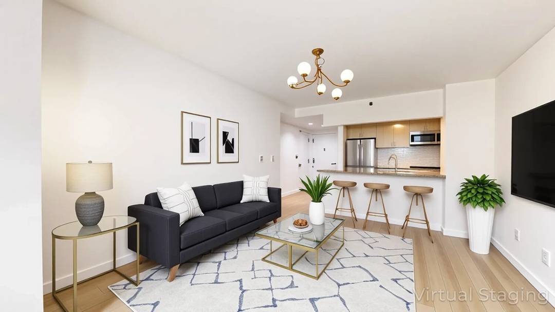 Spacious and bright, this two bedroom, two bathroom residence offers a modern layout with fantastic natural light through west facing windows overlooking Adam Clayton Powell Jr.
