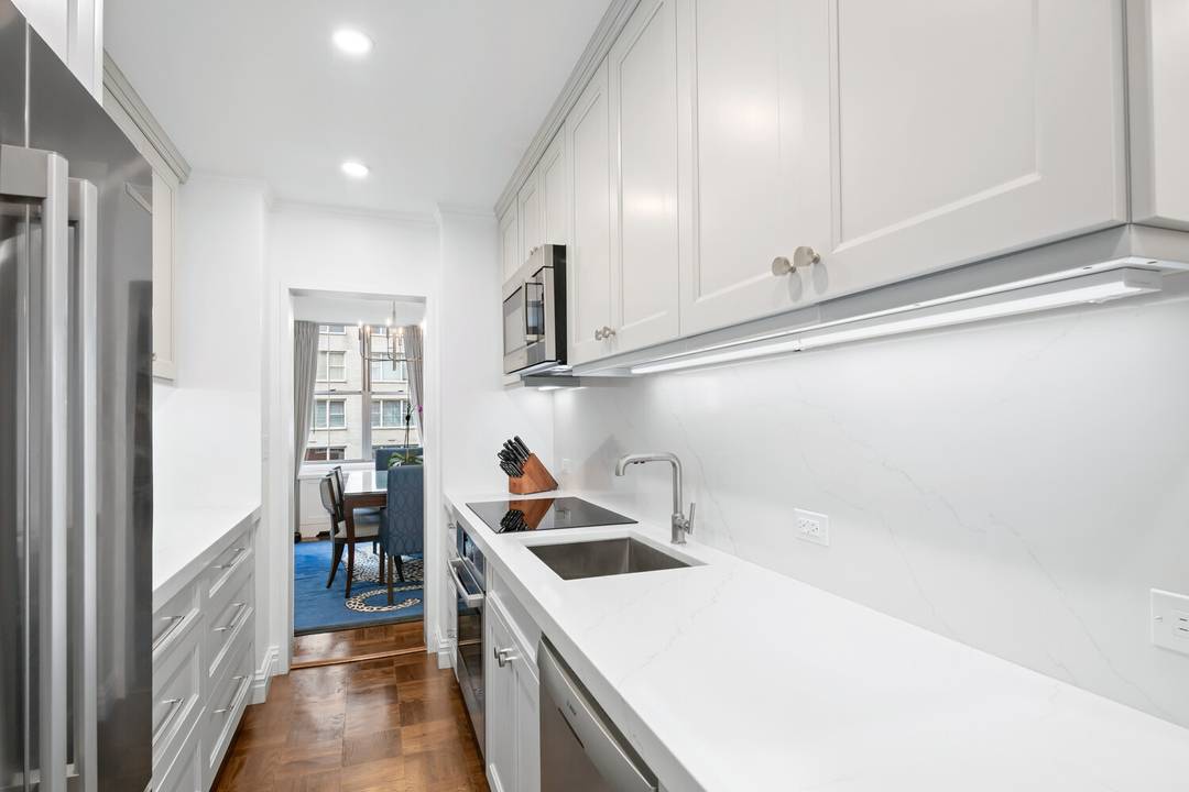 Bathed in western light and refined in every detail, this beautifully renovated two bedroom residence offers a quiet sense of grandeur just moments from Fifth Avenue and Central Park.