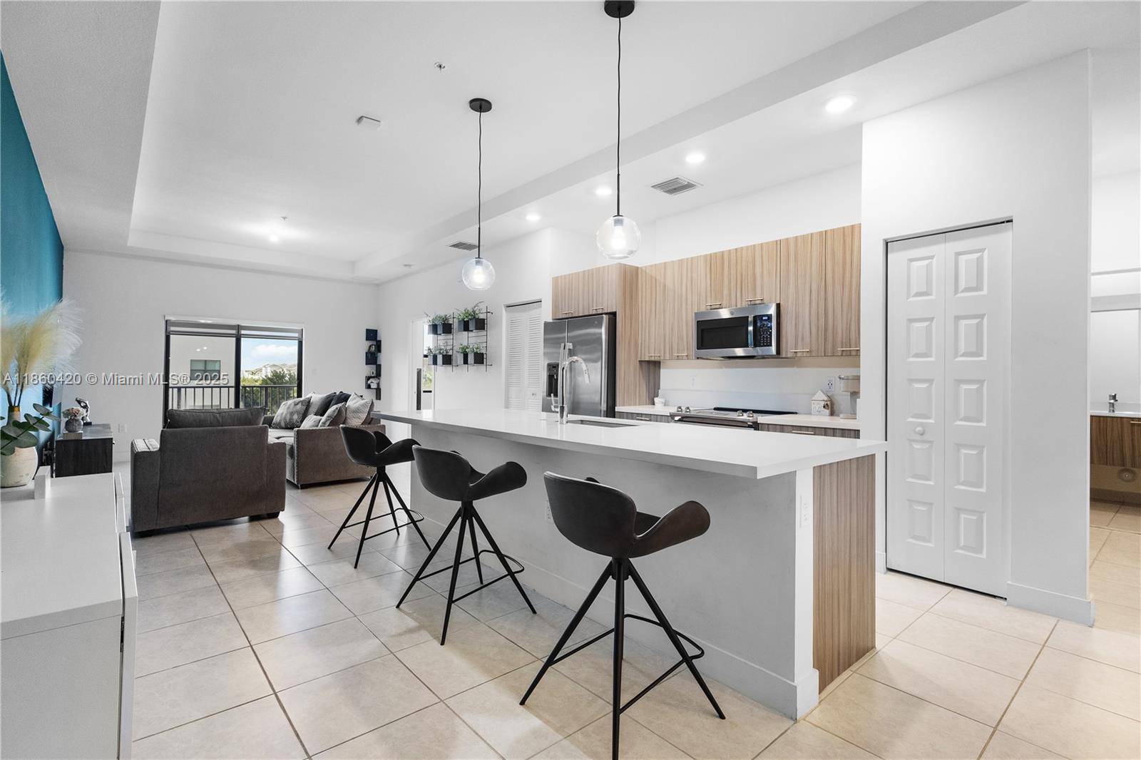 Beautiful corner unit with 3 bedrooms and 2 full bathrooms, ideally located in the gated community of APEX.