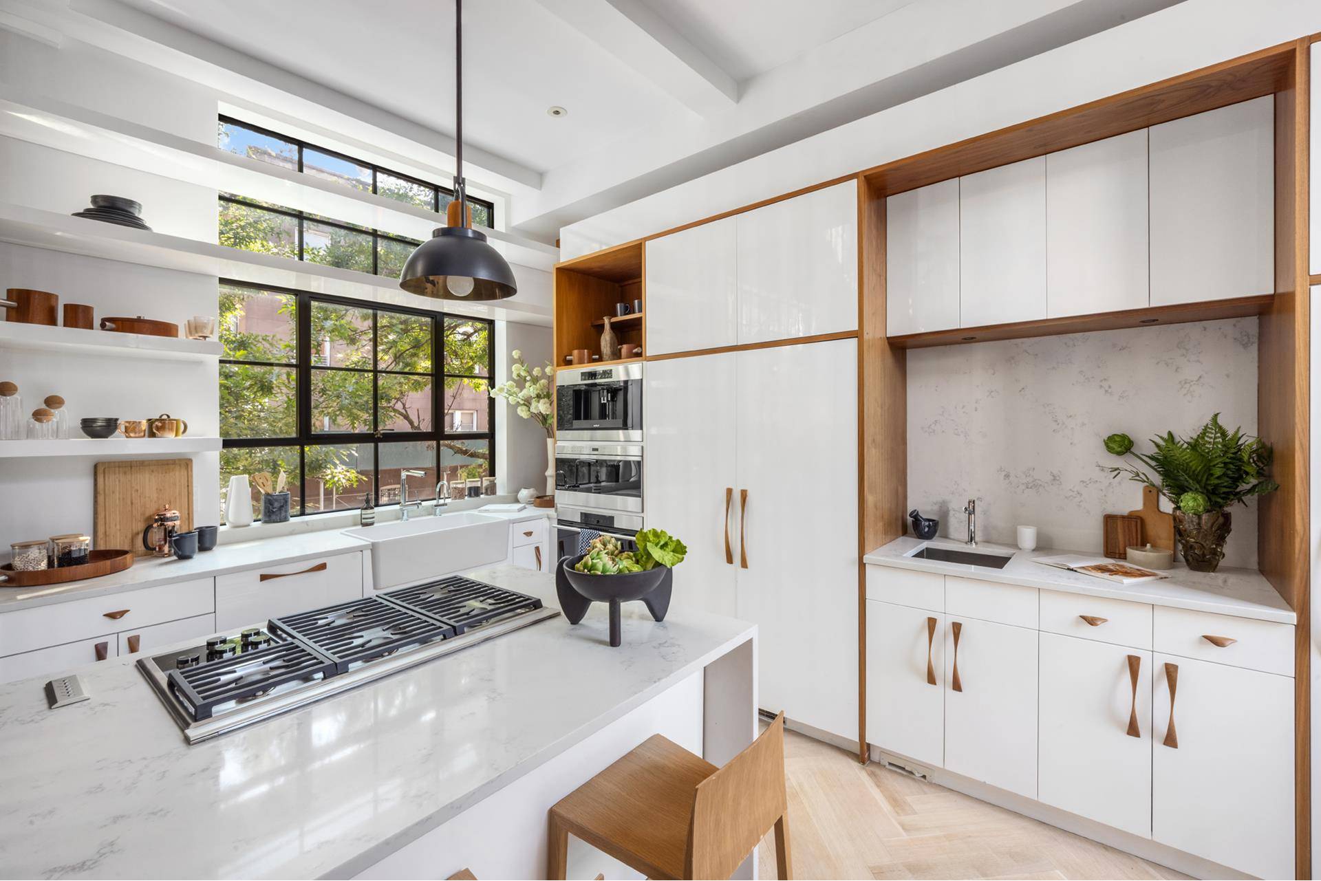 Welcome to 181 President Street, a private and exclusive Carroll Gardens townhome blending industrial elegance with modern luxury.