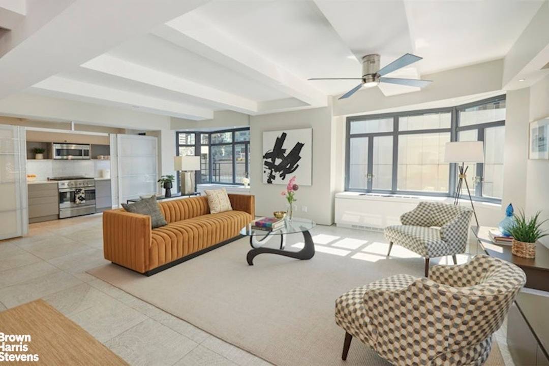 Apartment 11 12F is an expansive two bedroom, three bathroom duplex, perfectly positioned across from the Museum of Modern Art and surrounded by iconic New York landmarks, and a must ...