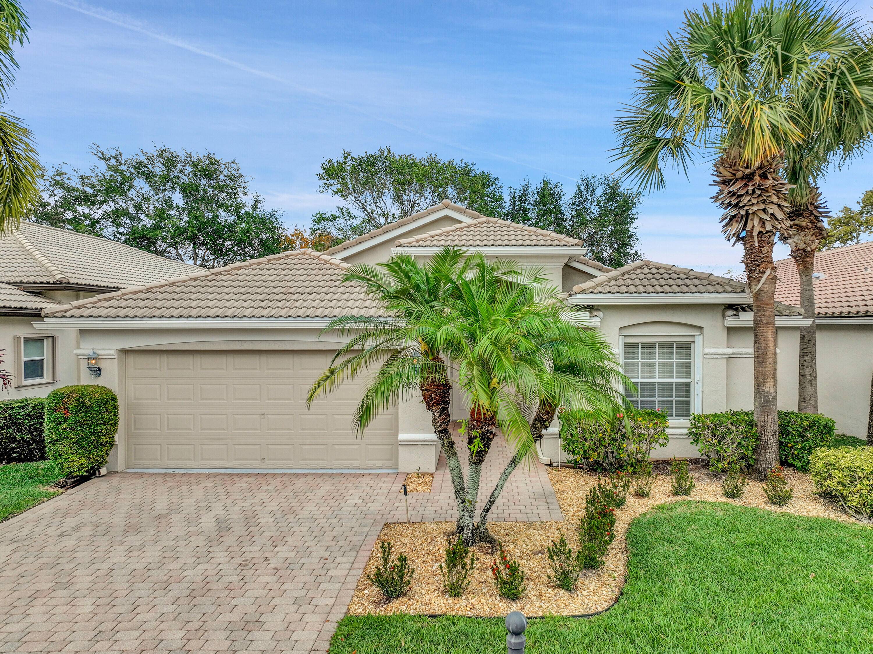 Beautifully upgraded 3BR 2BA Ferrera model offers a spacious open concept design enhanced by vaulted cathedral ceilings, creating a dramatic flow and stunning views of the tree lined, private backyard.