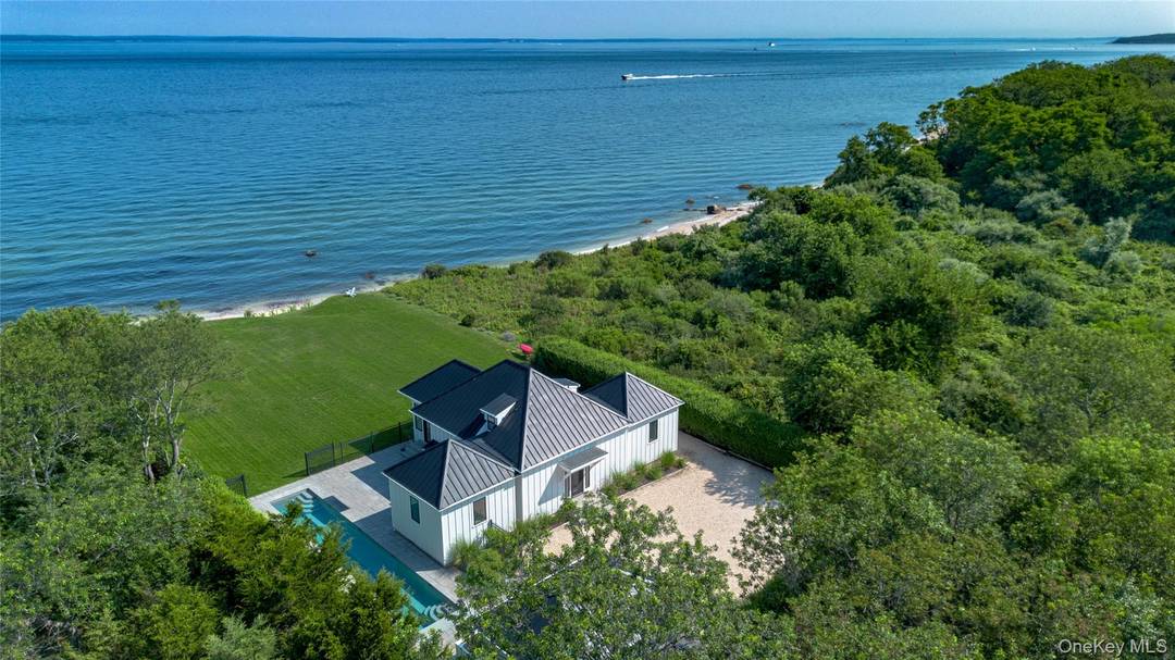 At the end of a secluded, private one mile road, where the land meets the Long Island Sound, this newly renovated modern beach house offers breathtaking views, refined design, and ...