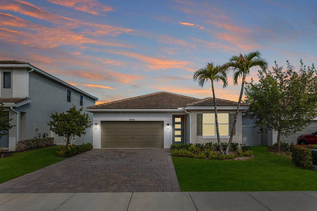 This exceptional 4 bedroom, 2 bath single level home in the highly sought after 'Reserve at Jupiter' community offers the perfect blend of modern luxury, comfort, and low maintenance living.