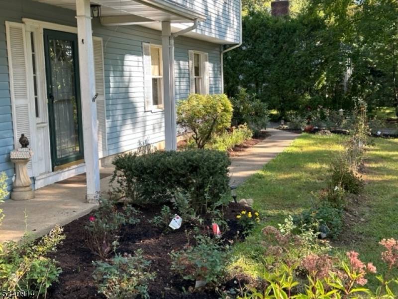 Spacious 5 bedroom, 2 and 1 2 bath Colonial in center of town.