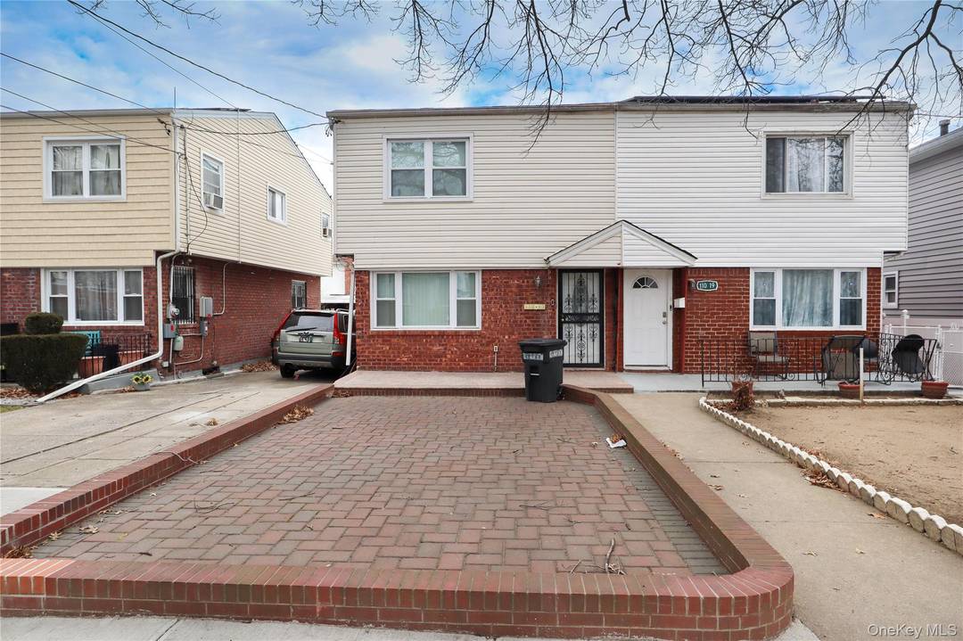 Single family Semi Attached Brick house with 3 bedrooms, 2 full bathrooms and a full finished basement in good condition.