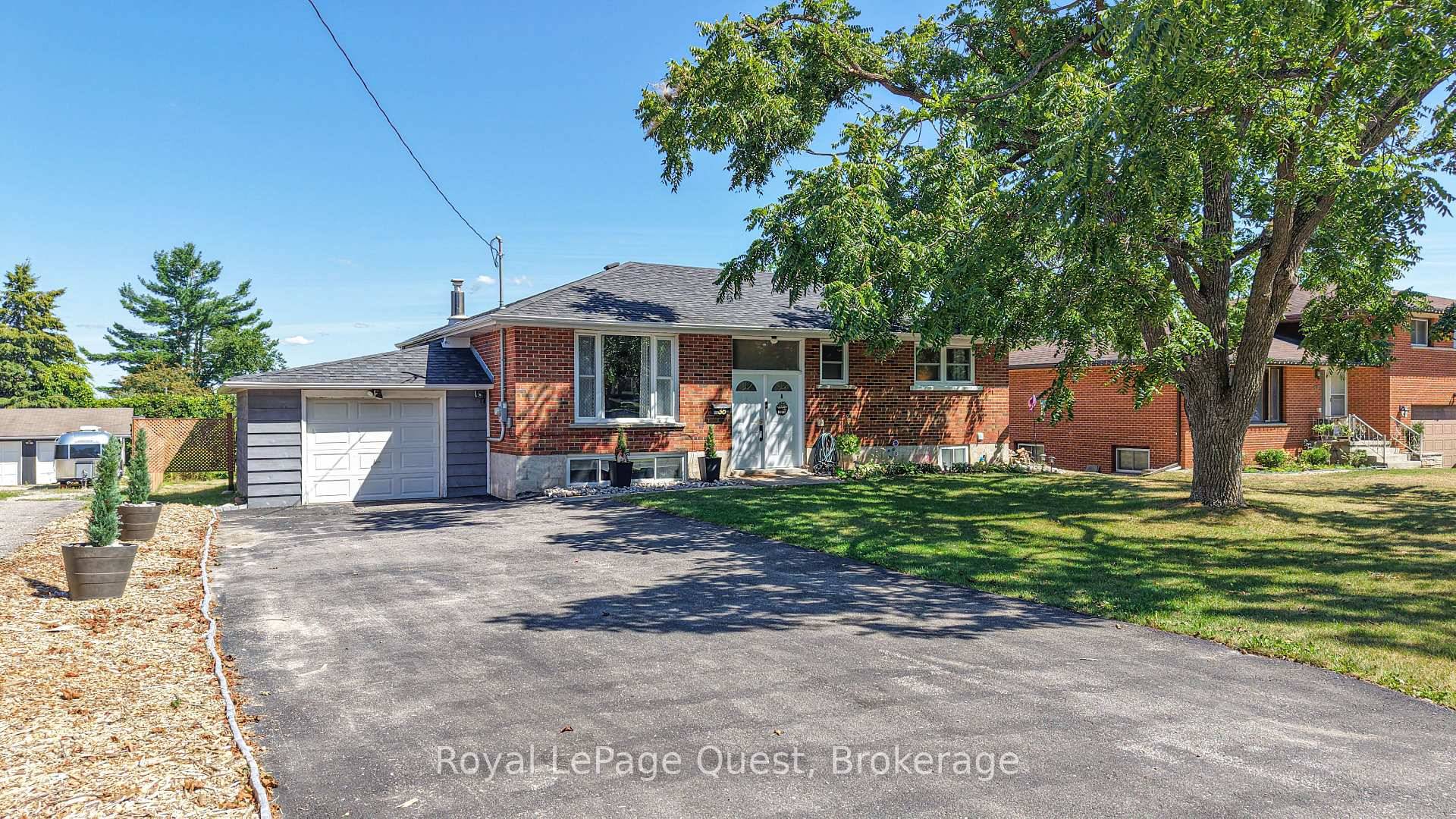 Set on a quiet west end street, this charming bungalow sits on a 75' x 200' lot with scenic views of Lake Simcoe.