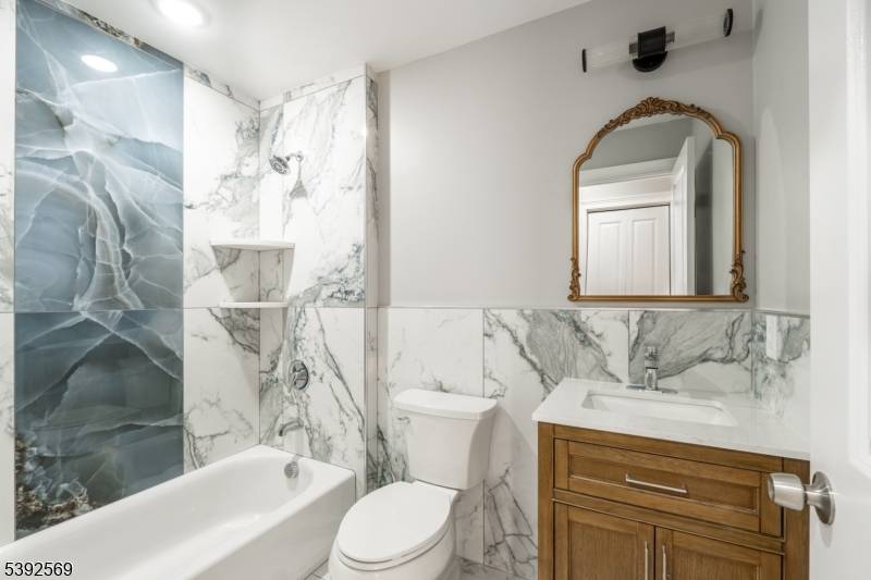 Welcome to this fully renovated, turn key 3 bedroom, 2 bath apartment offering high end finishes and modern comfort on one spacious floor.