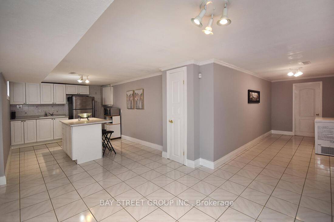 Beautifully well Renovated Basement Unit, Island In Kitchen, V floor, bedroom Double Closet Reno 3 Pc In Bedroom.
