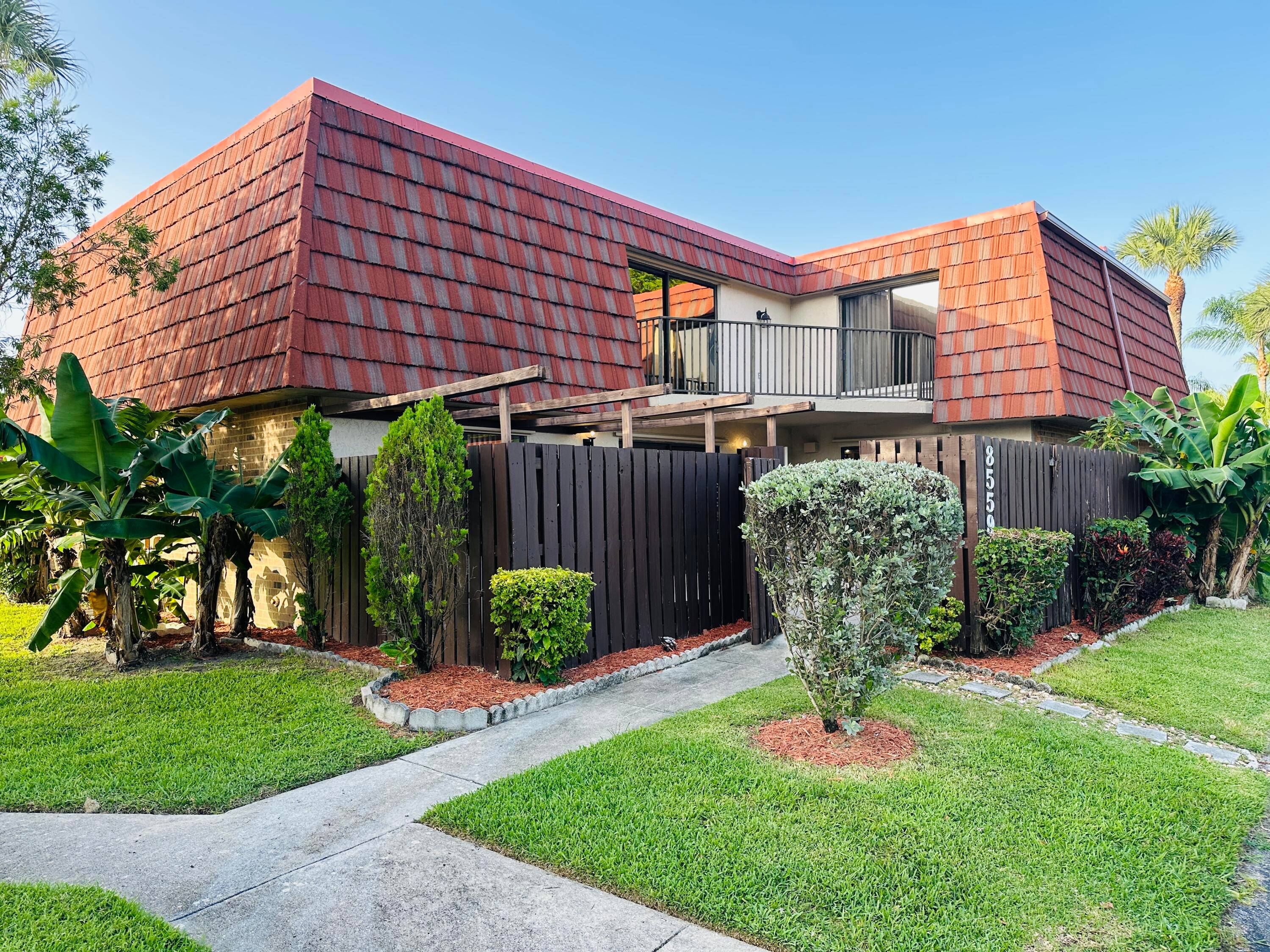 This gorgeous townhouse in West Boca Raton features a large private courtyard, perfect for barbecuing and enjoying the beautiful South Florida weather.