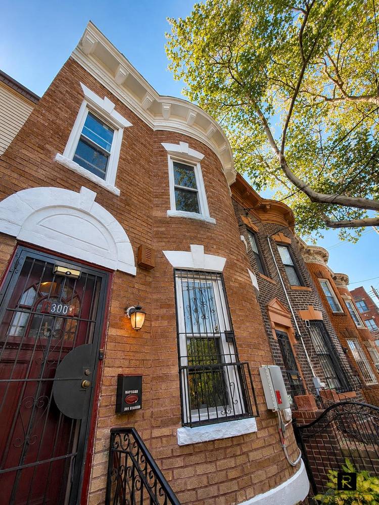 Nestled on a picturesque tree lined block, this charming brick townhouse offers a rare combination of timeless character, generous living space, and private outdoor living.
