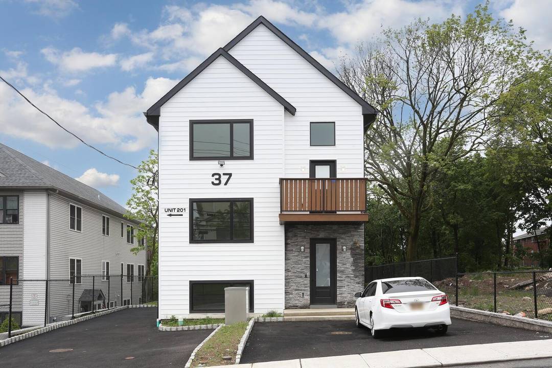 Discover the charm of modern living at 37 Ewing Avenue, Unit 201 !