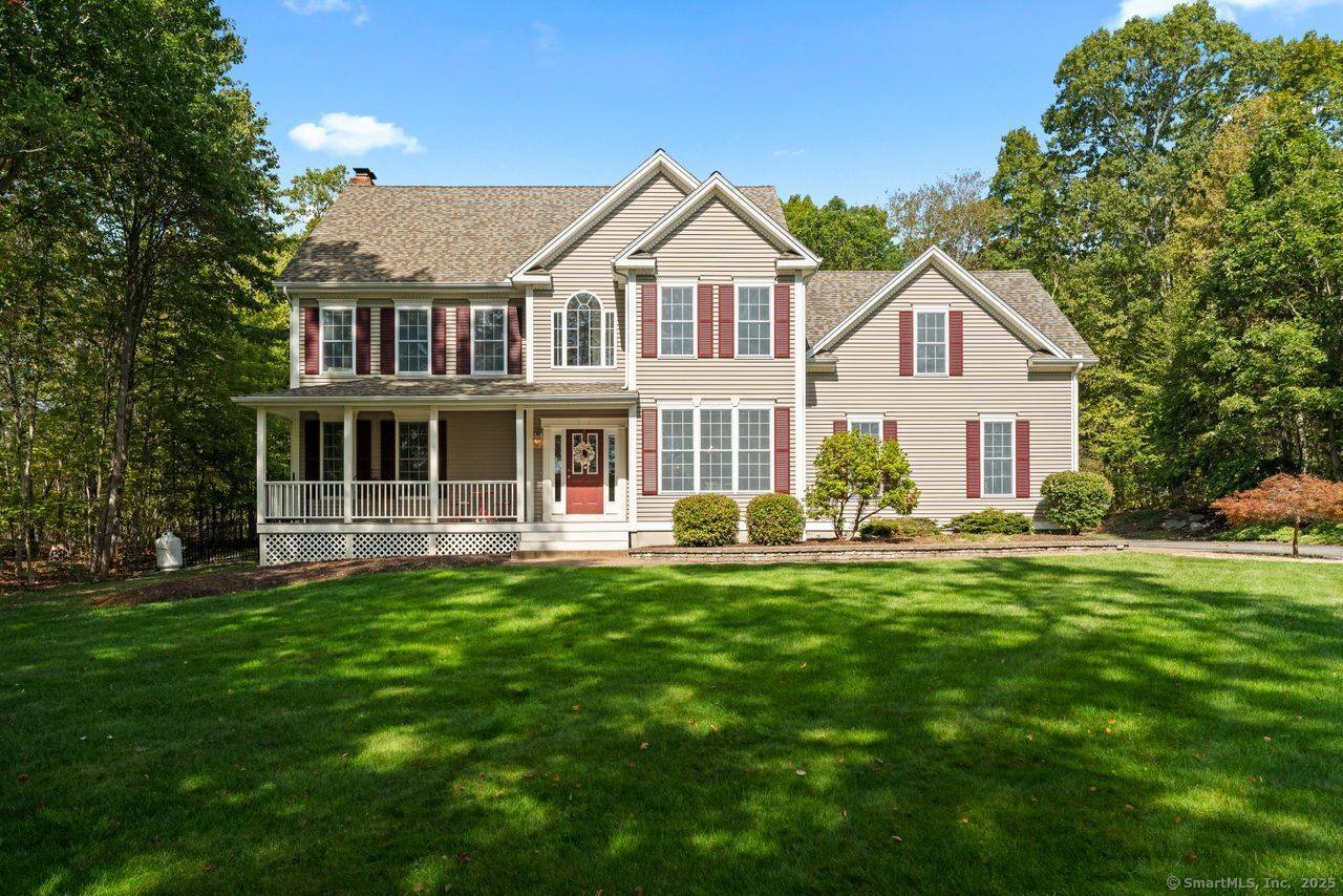 Set on a private 2 acre lot in a cul de sac neighborhood, this 4 bedroom, 2.