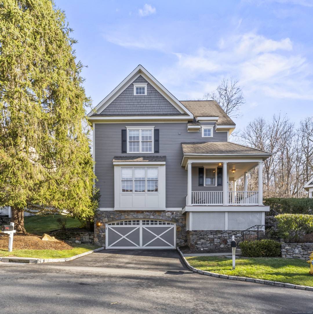 Beautifully renovated free standing townhouse condo in the desirable Redding Woods community of 23 detached homes, located where Weston, Wilton, Ridgefield, and Redding meet.