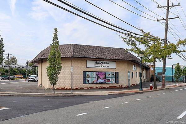 Extremely well maintained 7000 square foot Retail Industrial building on a corner of Merrick Road and Rocklyn Ave.