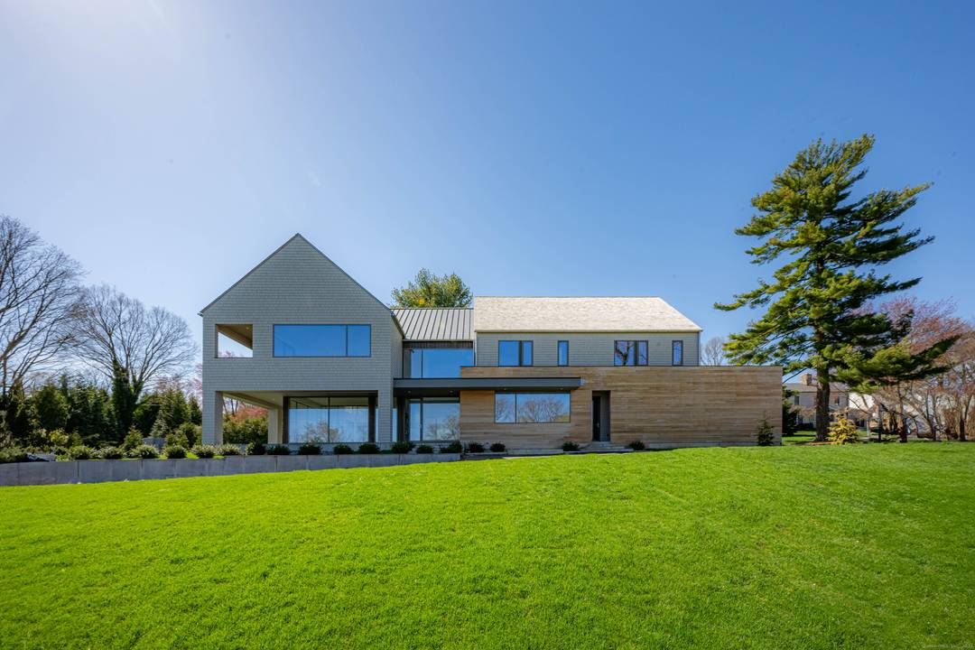 World class one of a kind newly constructed modern masterpiece designed by award winning architect Vita design with stunning unobstructed water views from every room in the house.