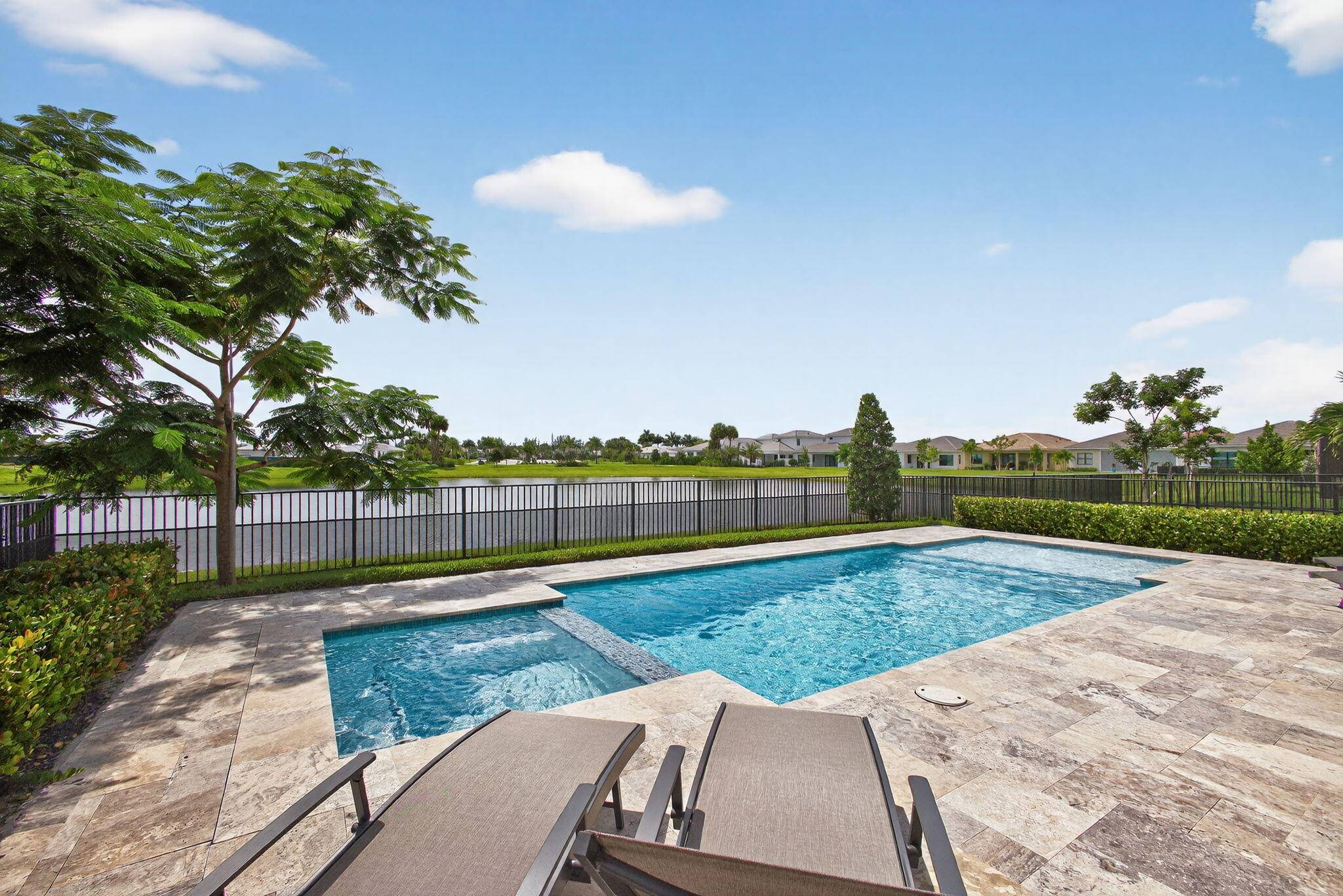 This is luxury Florida living at its finest, located on a waterfront lot, this designer styled home has been throughly crafted with limitless upgrades and high end finishes.