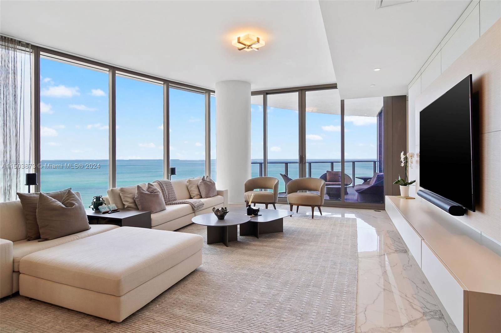 Welcome to the epitome of luxury living at The Ritz Carlton Sunny Isles, where this exquisite flow through 4 bed amp ; 4.