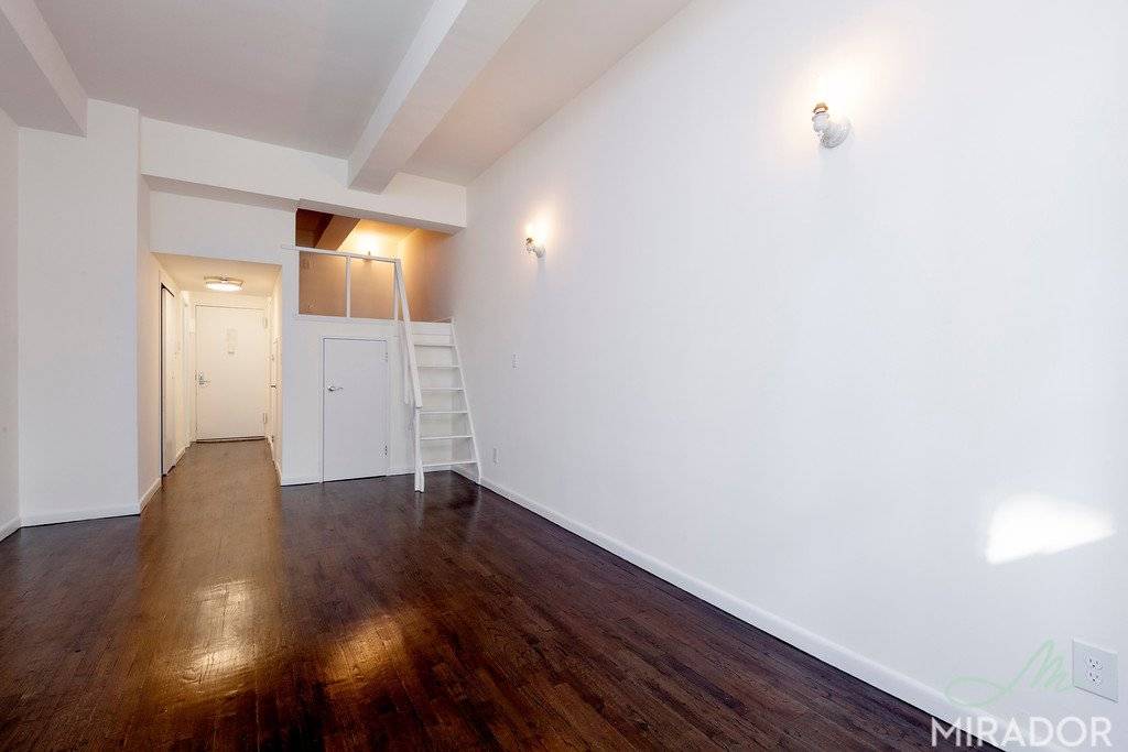Lofty Chelsea studio apartment just a couple of blocks from Union Square and right by the L, F amp ; M train with a sleep loft, extra high ceilings, refinished ...