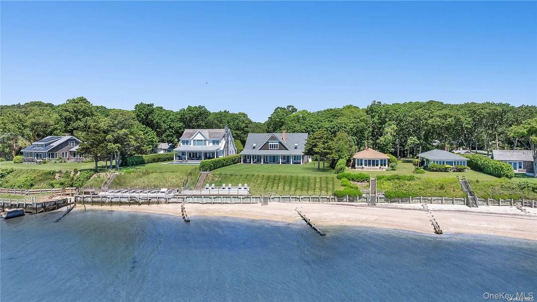 Welcome to a unique luxury waterfront estate, perfectly situated overlooking the Peconic Bay, with stunning views of Robin's Island and the Hamptons.
