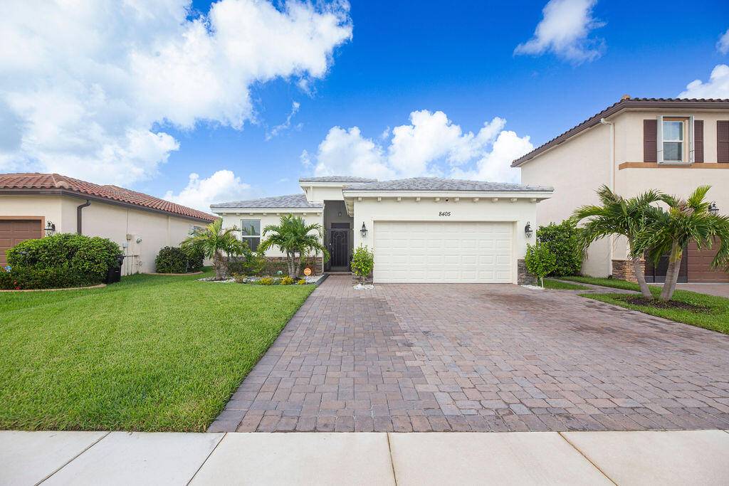 Welcome to this stunning Brilliance model smart home in the desirable Copper Creek community, showcasing an upgraded stone elevation and breathtaking lake views from nearly every room.