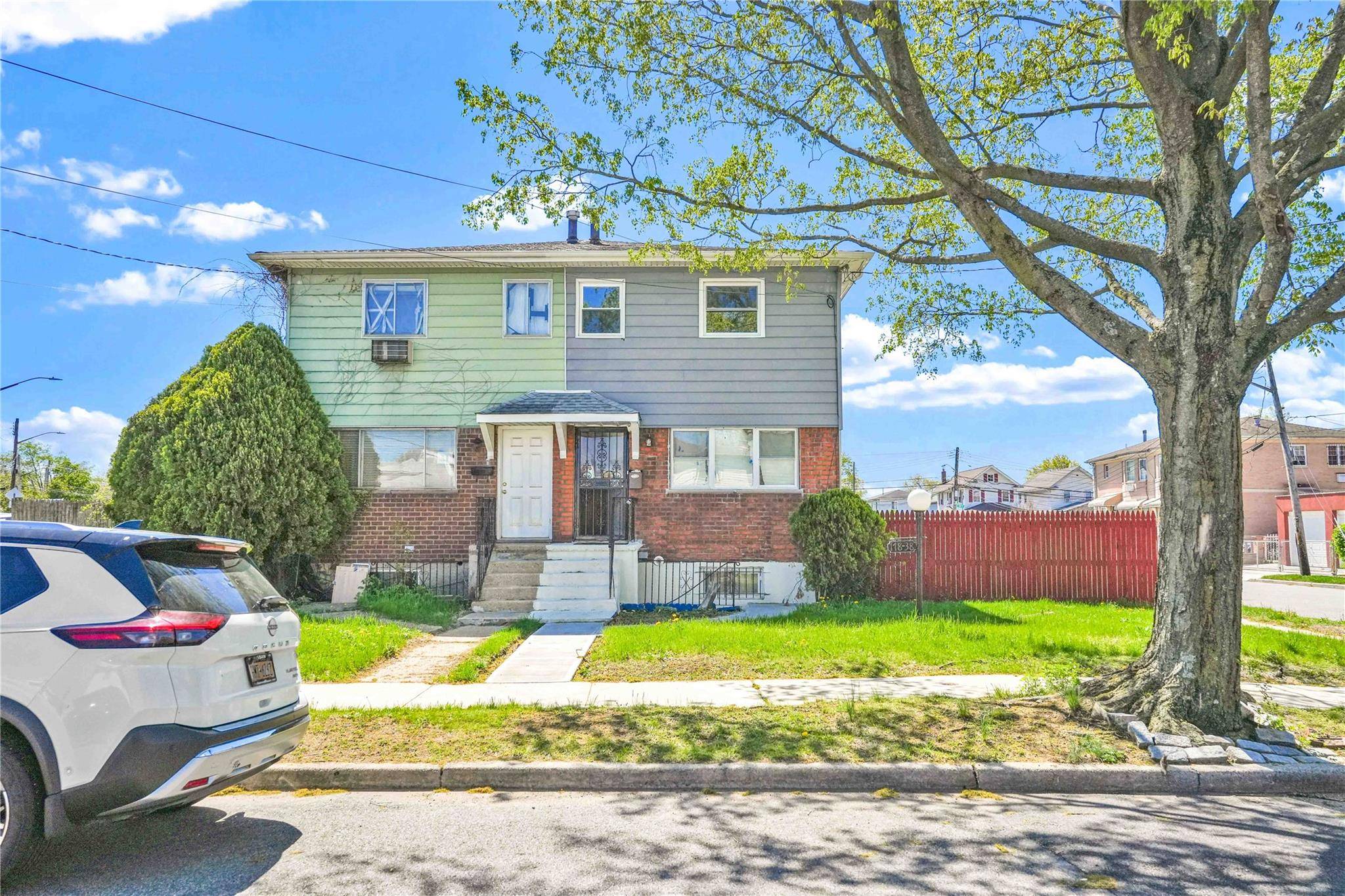 Welcome to 178 38 134th Avenue, a charming corner home in the heart of Springfield Gardens, Queens.
