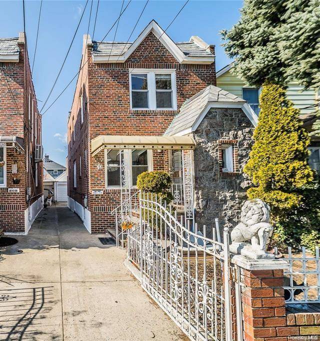 Charming single family home in the heart of South Ozone Park featuring three bedrooms and two and a half bathrooms.