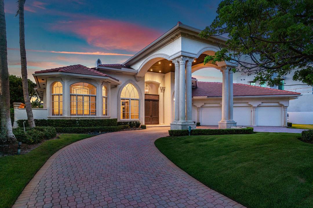 Discover the perfect opportunity to renovate or build your dream home in one of Boca Raton's most prestigious communities Royal Palm Yacht Country Club.