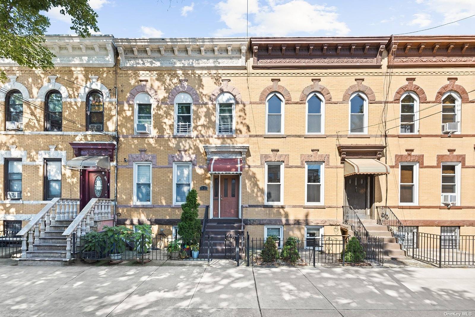 RENAISSANCE REVIVAL 2 FAMILY ROW HOUSE Built in 1915, standing 20' by 55' on 100' lot.