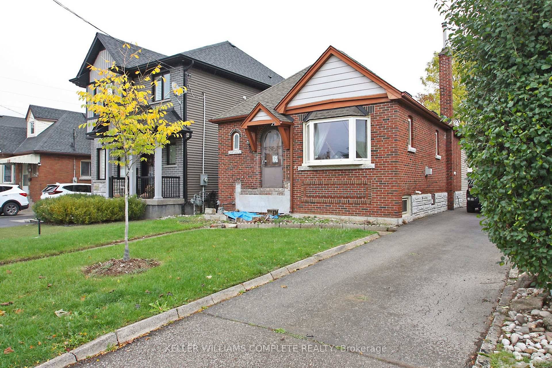 Endless possibilities await with this charming brick bungalow in Hamilton's East End !