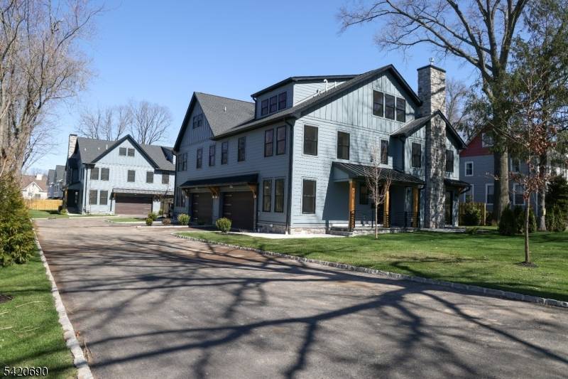 Welcome to Central Villas, a refined end unit townhome in the heart of New Providence, a seamless blend of modern design effortless living.