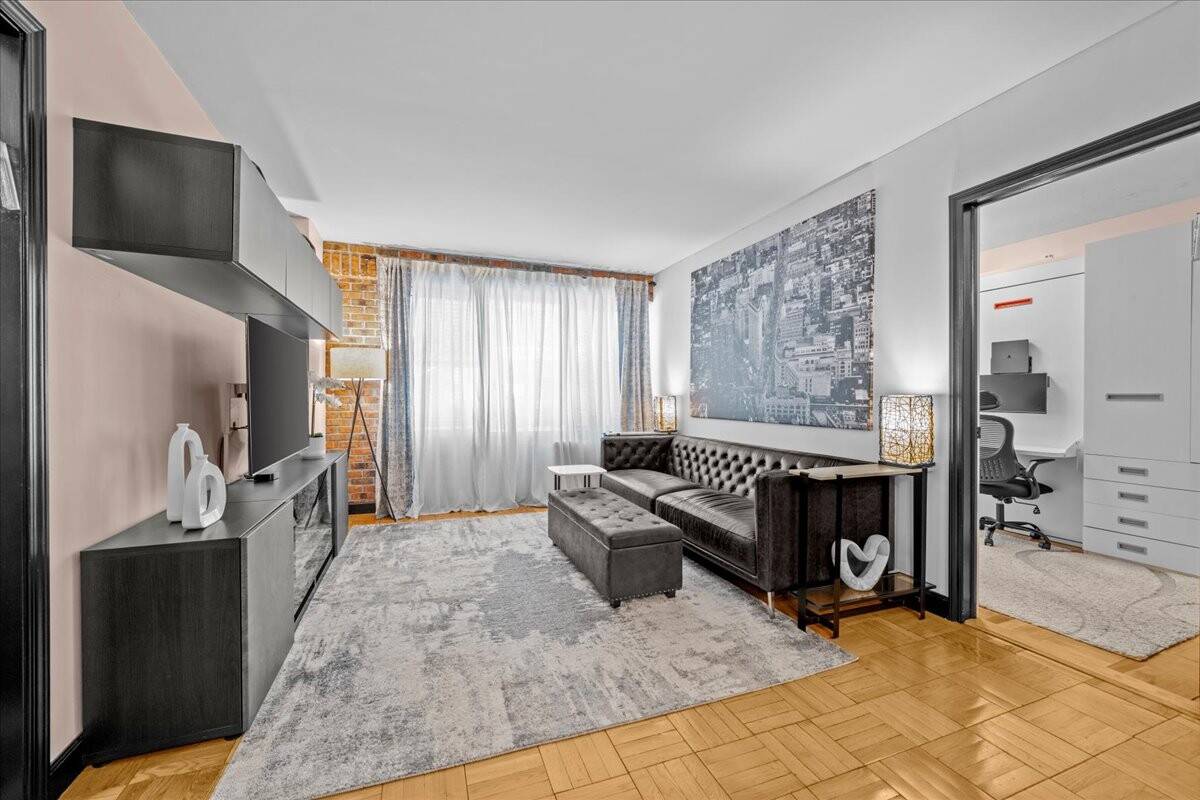 This thoughtfully designed two bedroom, two bathroom home offers a flexible layout, warm details and an unbeatable Midtown East location.