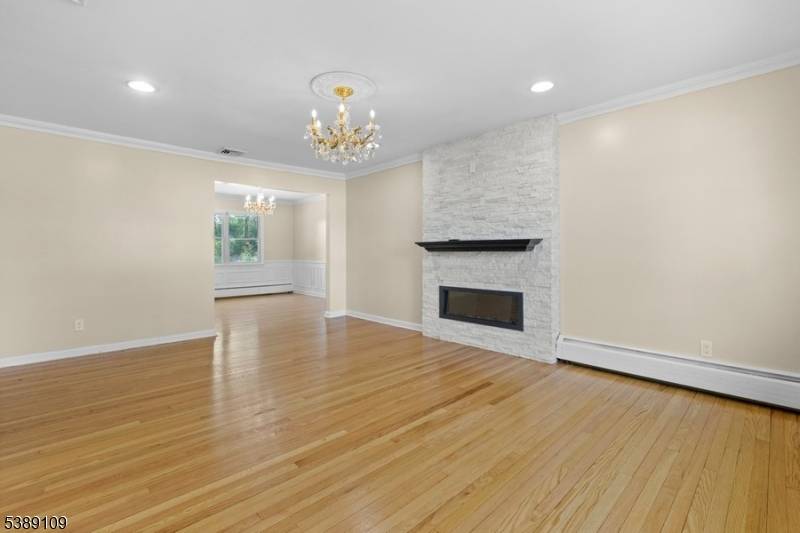 Welcome to this beautiful Sun drenched, spacious, renovated split level home with magnificent views of the Golf Course !