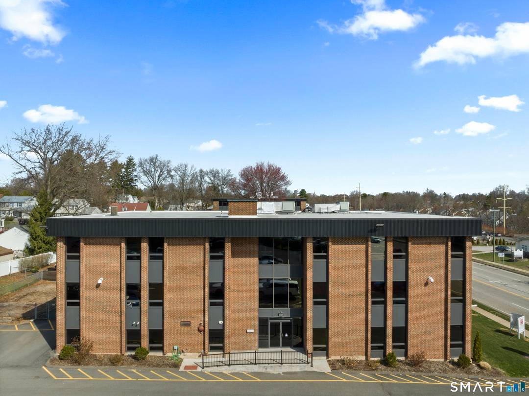 Well maintained, three story commercial office building located along the highly visible Silas Deane Highway corridor in Wethersfield.