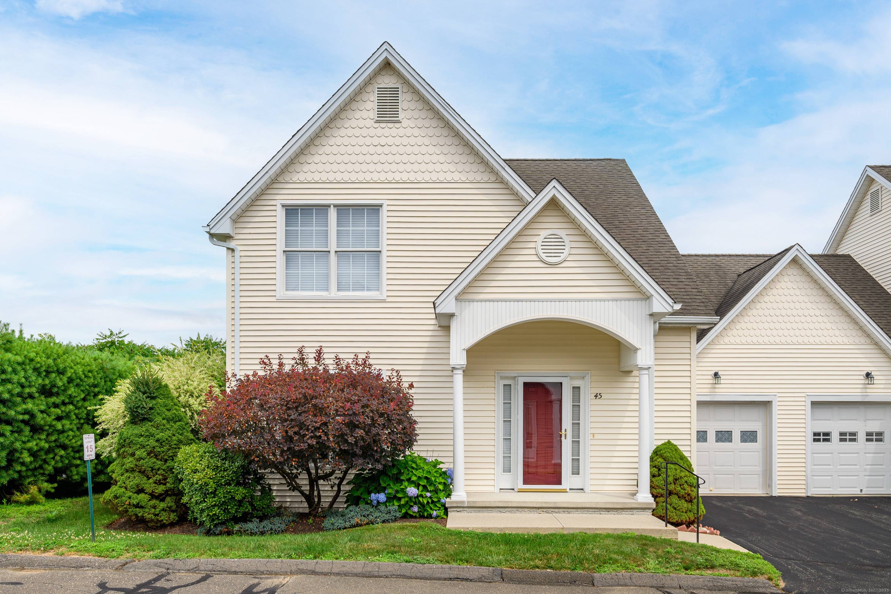 Welcome to 45 Heron View Rd an inviting end unit in The Woods at Dunham Pond, a 55 active adult community in the heart of New Fairfield.