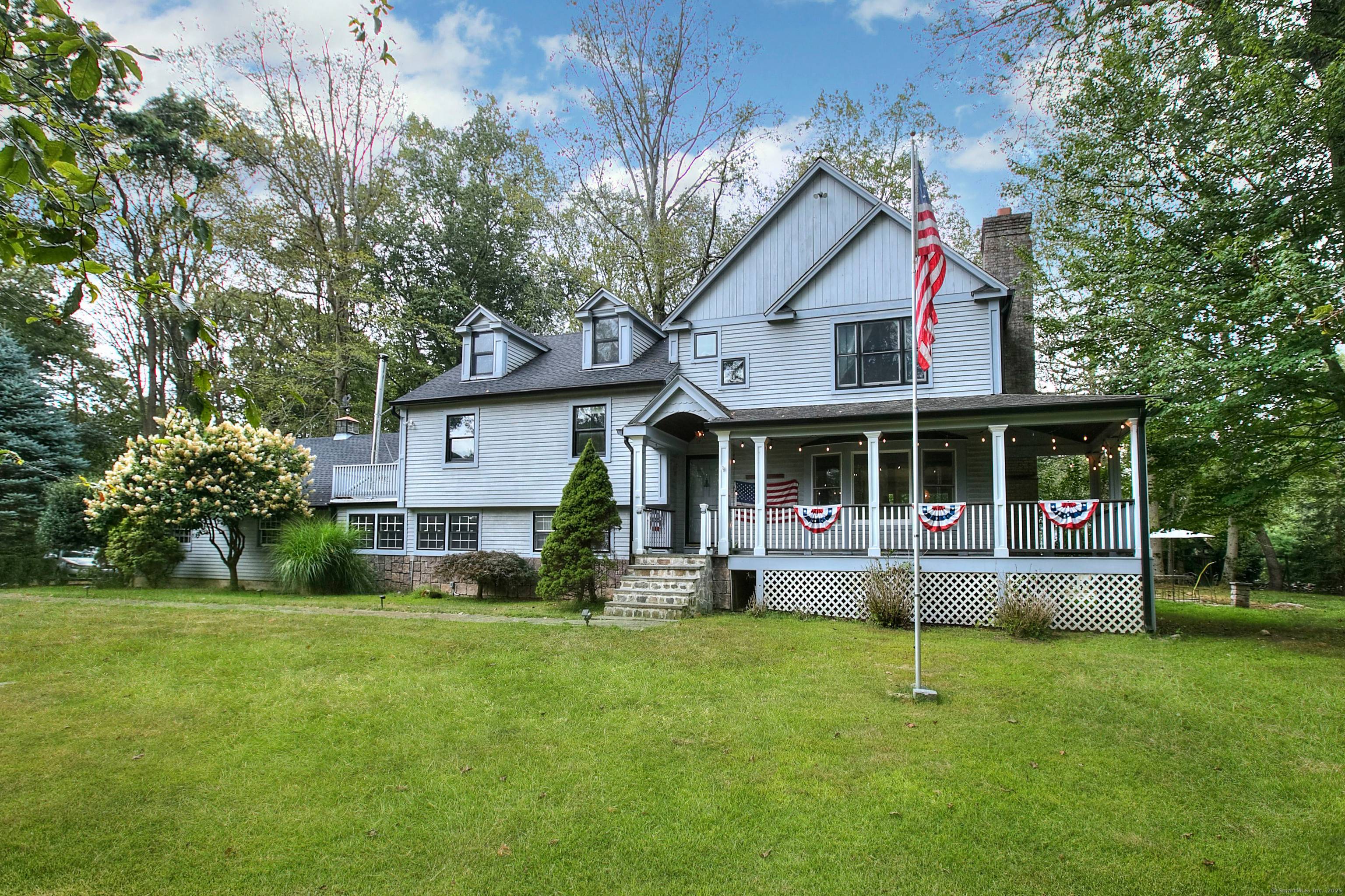 Nestled on a level one acre lot within a coveted cul de sac and surrounded by higher end homes, this beautifully updated residence offers five spacious bedrooms and four well ...